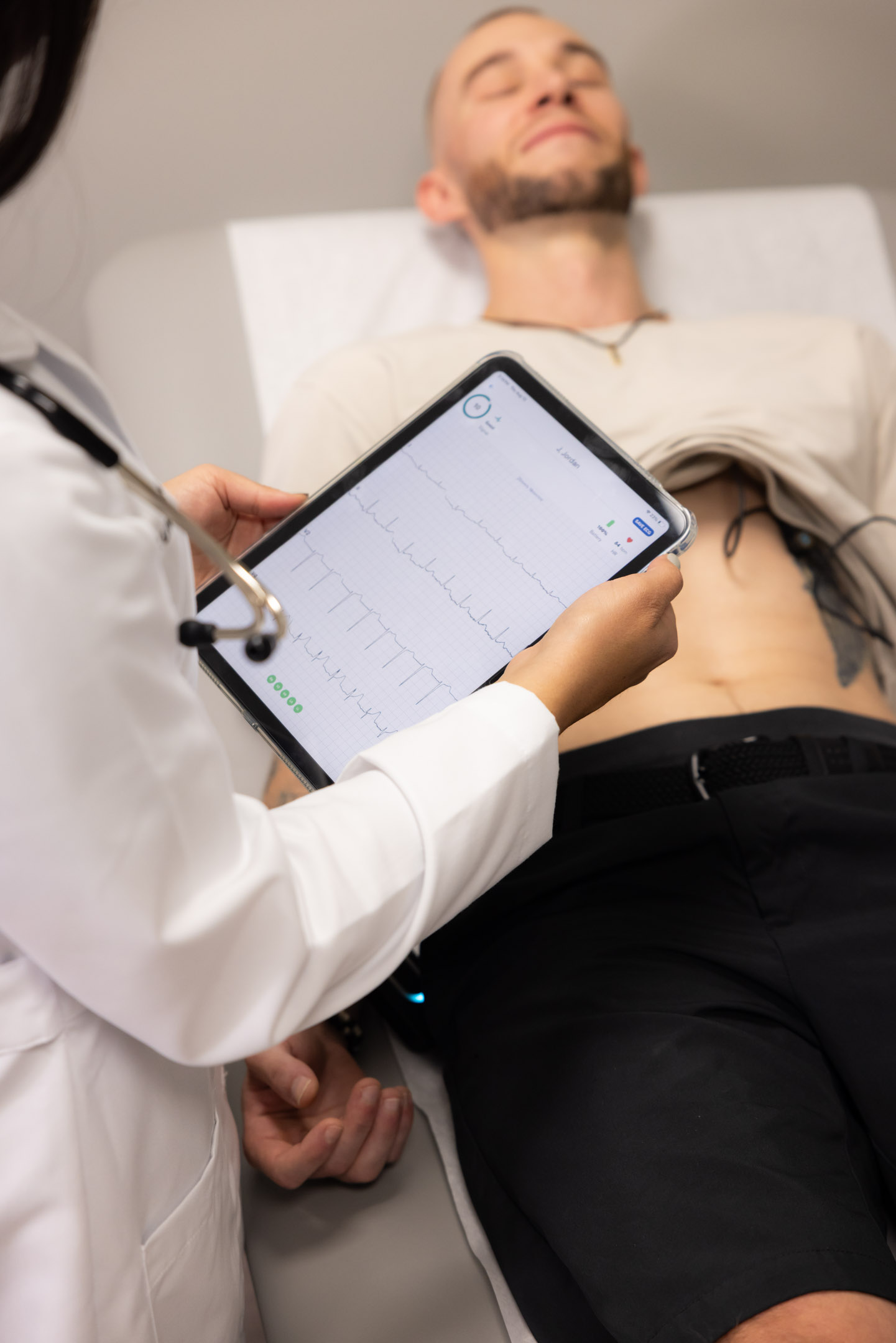 Rx ReLeaf practitioner reviewing clinical monitoring results with a patient